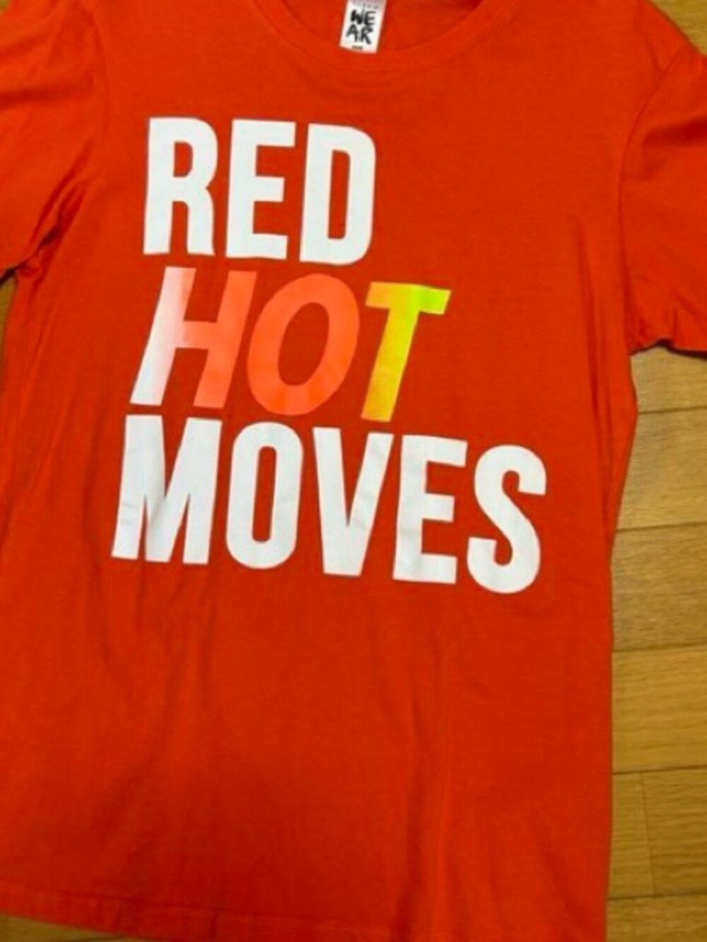 Zumba orange top "Red Hot Moves" new with tags